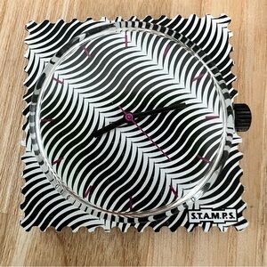S.T.A.M.P.S. Interchangeable watch face with black white illusion pattern